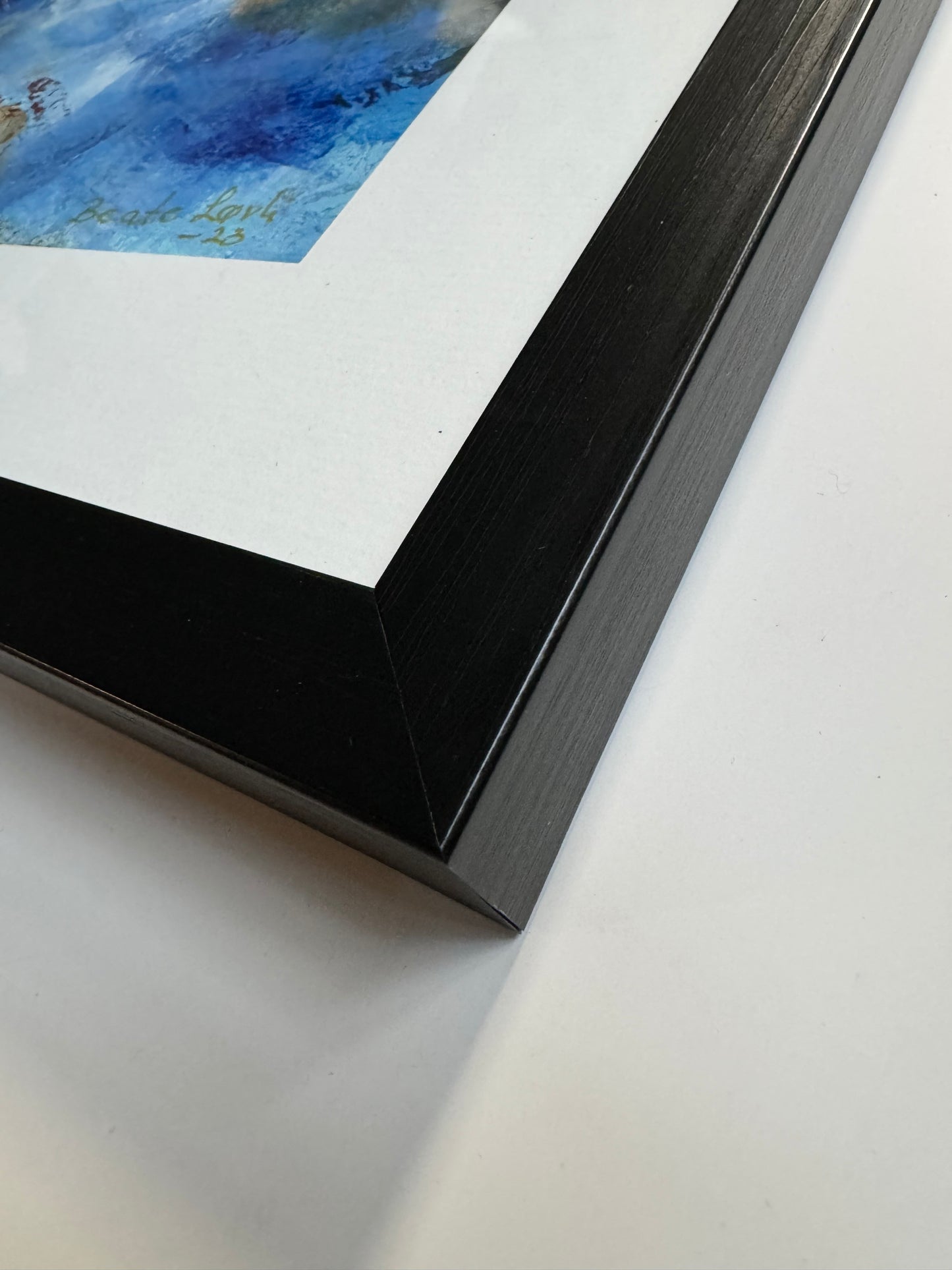 "Univers" innrammet med passepartout